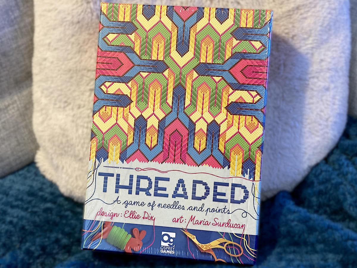 Threaded: A Game of Needles and Points